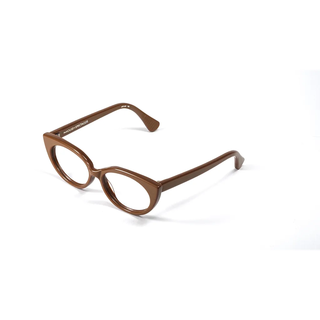 TIG heavy Turmeric glasses — angled view showing sculptural depth and elegant tapered shape, handcrafted in London