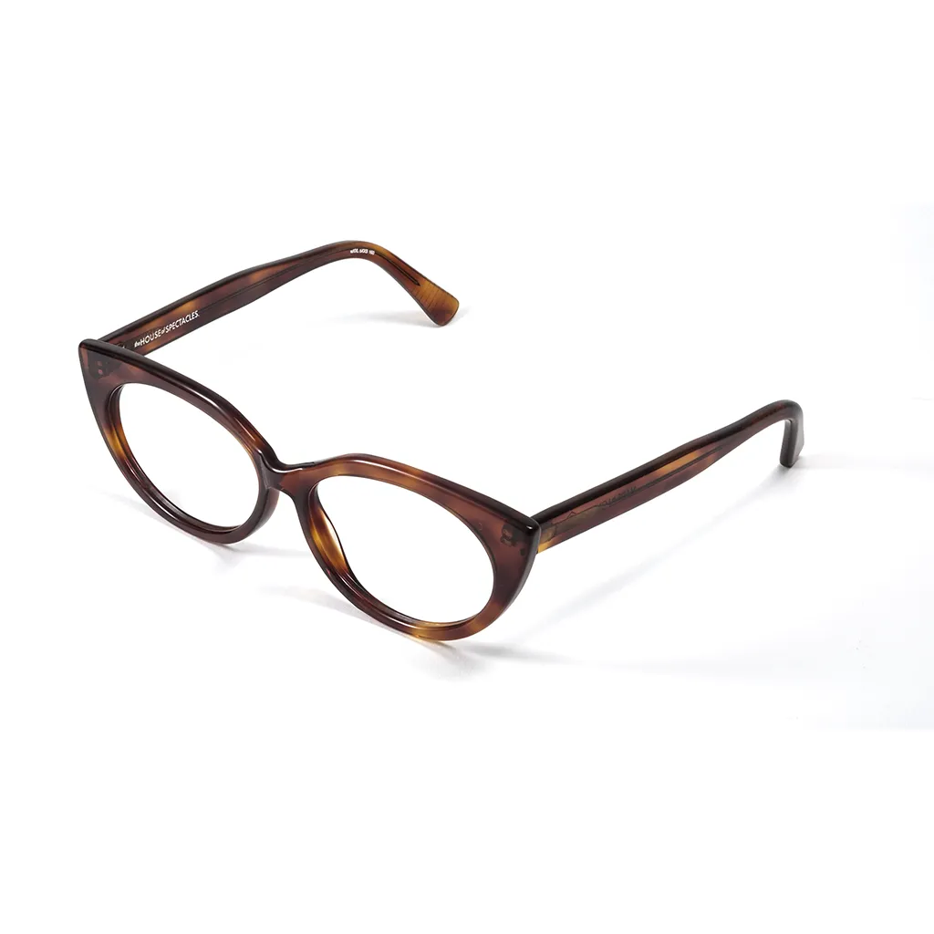 TIG heavy dark tortoise glasses — angled view highlighting rich tortoise tones and bold depth, handcrafted in London.