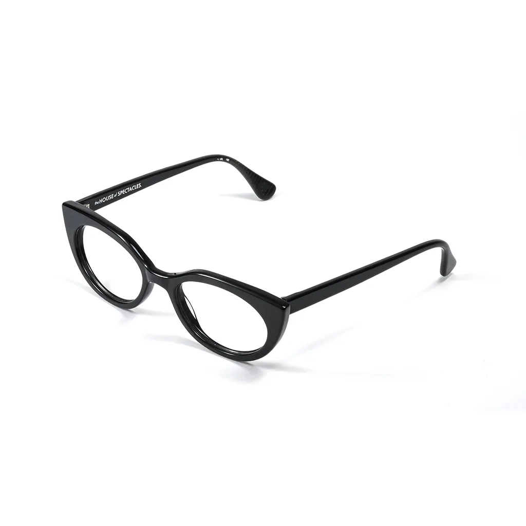 TIG heavy gloss black glasses — angled view showing smooth polished profile and pronounced upsweep, handcrafted in London.