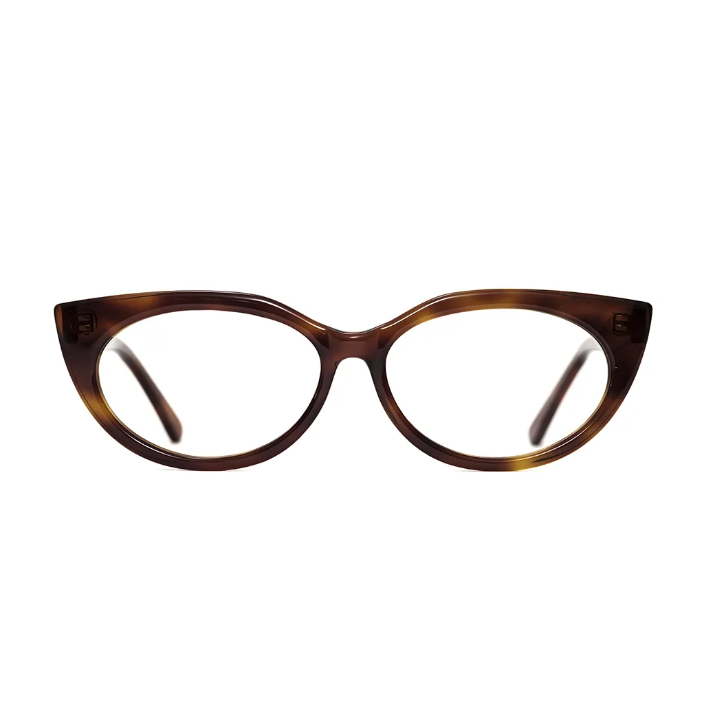 TIG heavy line frame in dark tortoise acetate — front view, expressive upswept oval design with strong presence, made to measure and crafted in London.
